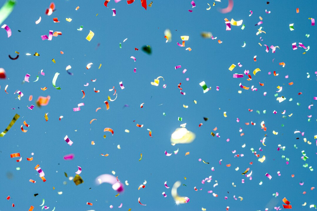 Colorful confetti and party lights celebration scene